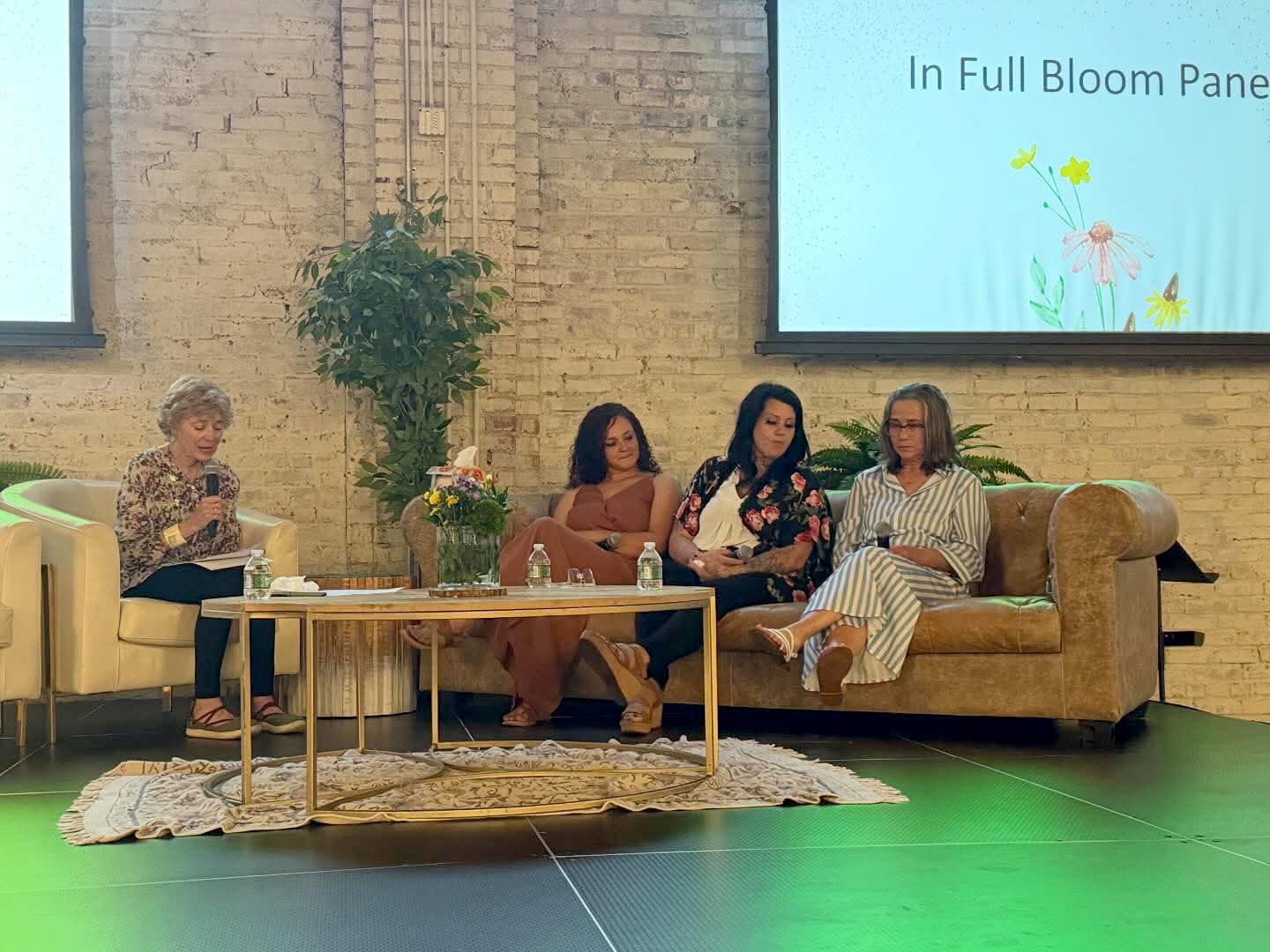 Caity, Reva, and Taffny took the stage with moderator Barb Stuber.